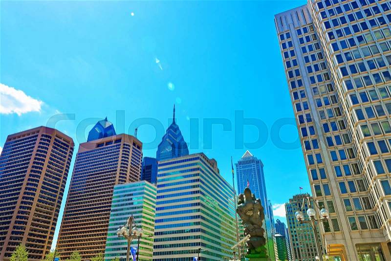 Government of the people sculpture and Skyline with skyscrapers in Philadelphia, Pennsylvania, the USA, stock photo