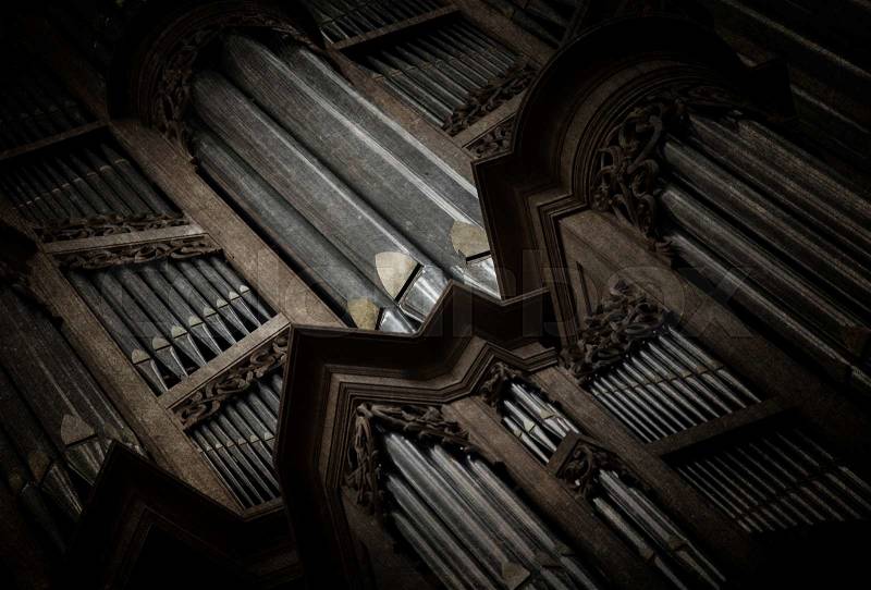 Creepy image of an old pipe organ in a church - Vintage, selective focus, stock photo