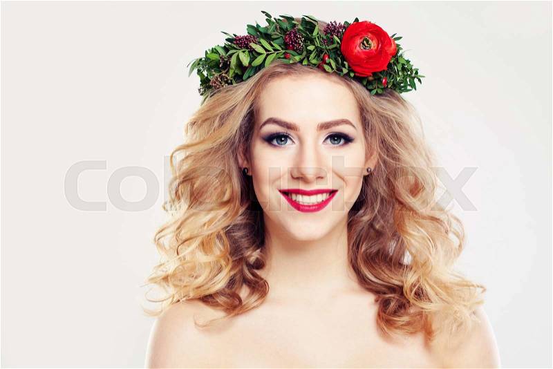 Woman with Clear Skin, Curly Blond Hair and Flowers Wreath, stock photo