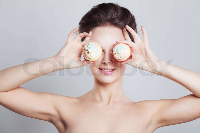 Woman and Sweet Cake Snack. Temptation, stock photo