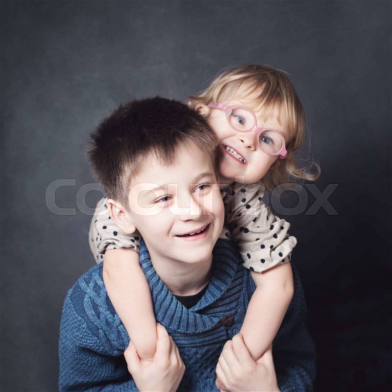 Hugging Children. Brother and Sister, stock photo