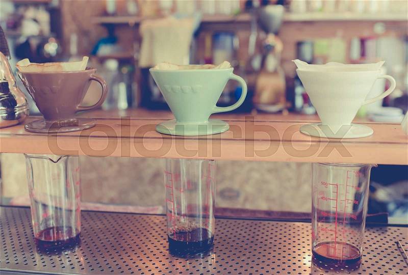 Kits for making fresh coffee drip in vintage tone, stock photo