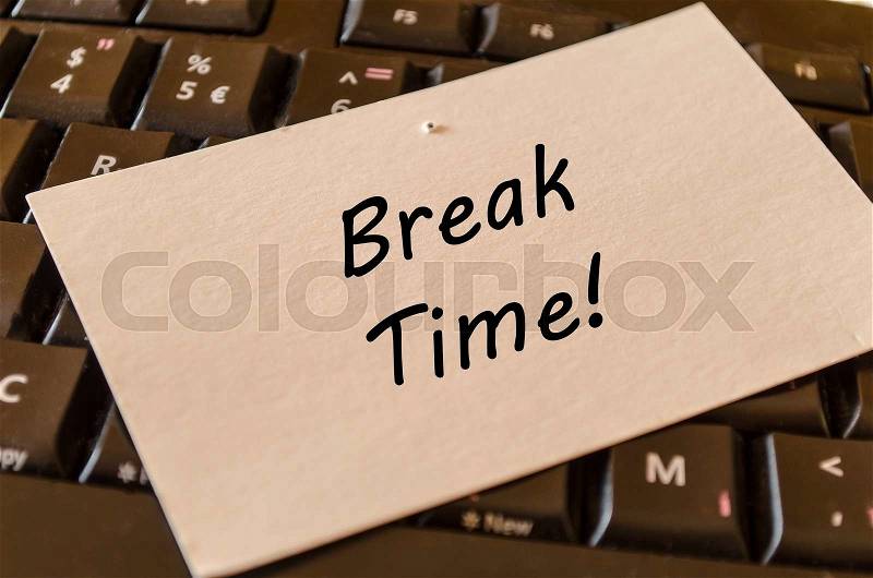 Break time concept on black keyboard background, stock photo