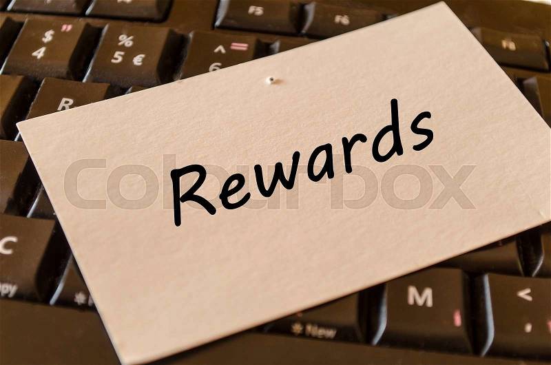 Rewards concept on black keyboard background, stock photo