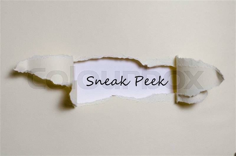 The word sneak peek appearing behind torn paper, stock photo