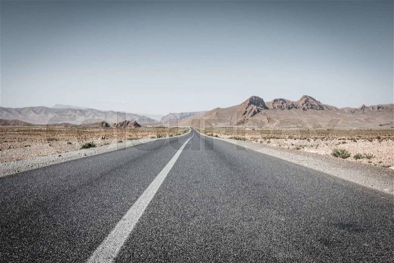 Desert road in Morocco, stock photo