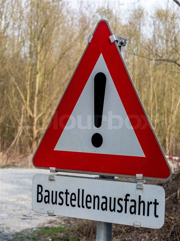 A traffic sign has hiun to exit a building site, stock photo