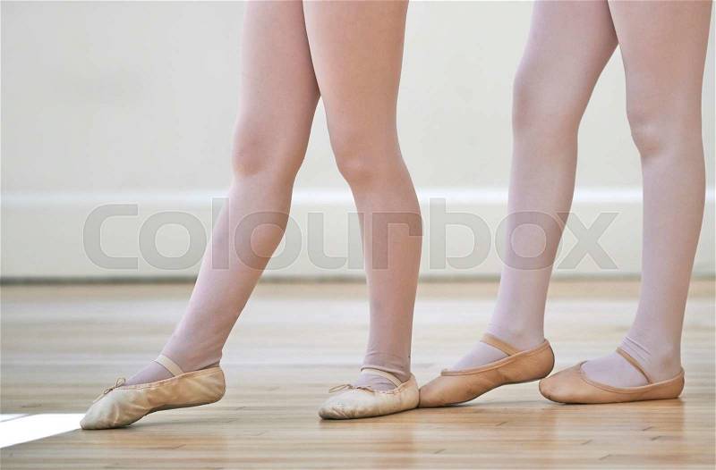 Close Up Of Feet In Children\'s Ballet Dancing Class, stock photo