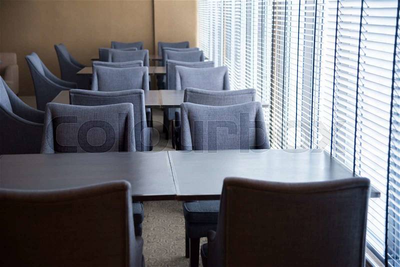 Rows of chairs in meeting room, stock photo