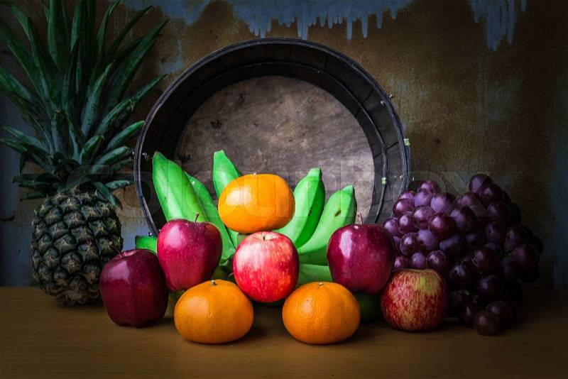 Apple and several kinds of fruits paste arranged on a wooden, stock photo