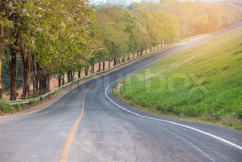 An empty winding long road, stock photo