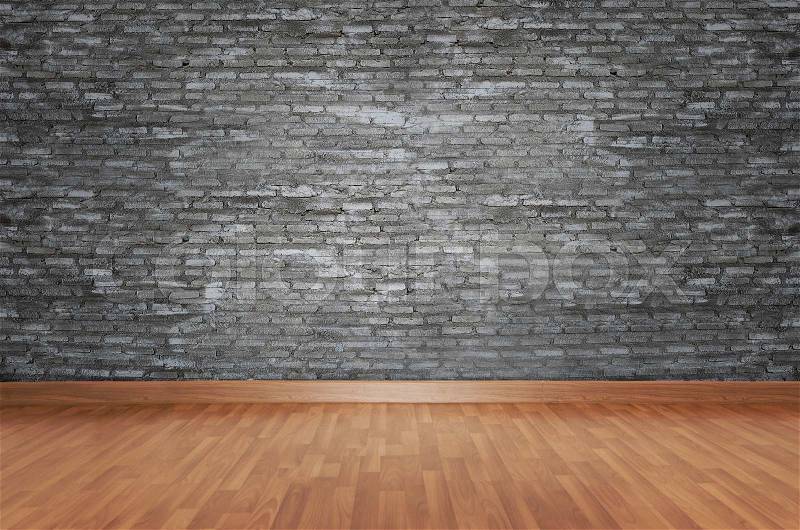 Brown wood plank floor with black brick texture wall, stock photo