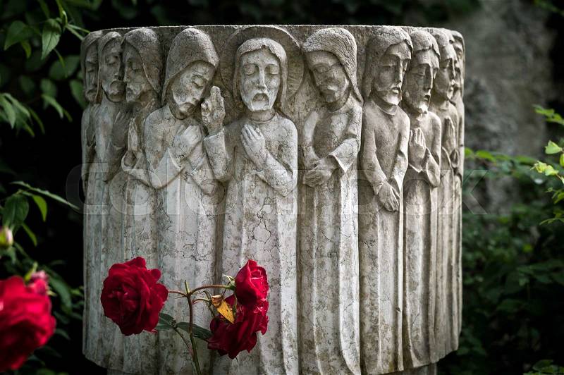 Jesus and his disciples on a grave in a cemetery, stock photo