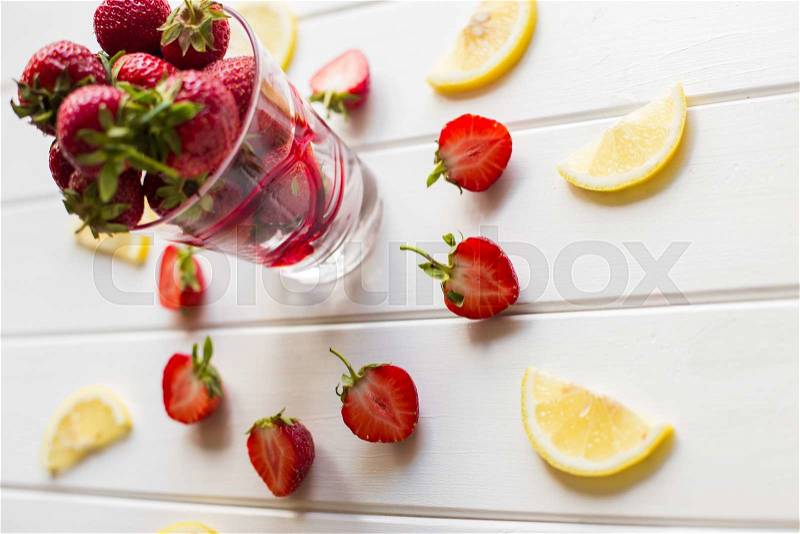 Lemon and strawberries, source of vitamin C, stock photo