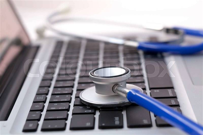 Stethoscope on laptop - Computer repair and maintenance concept, stock photo