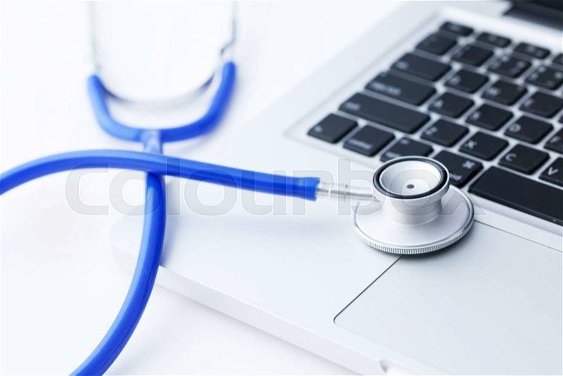Stethoscope on laptop - Computer repair and maintenance concept, stock photo