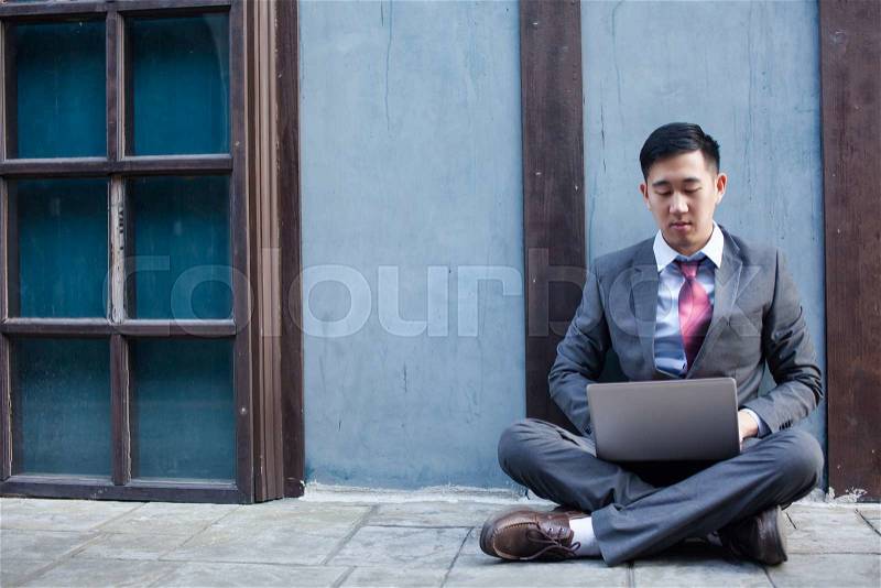 Business Man Working Outdoor - Work Anywhere Concept, stock photo
