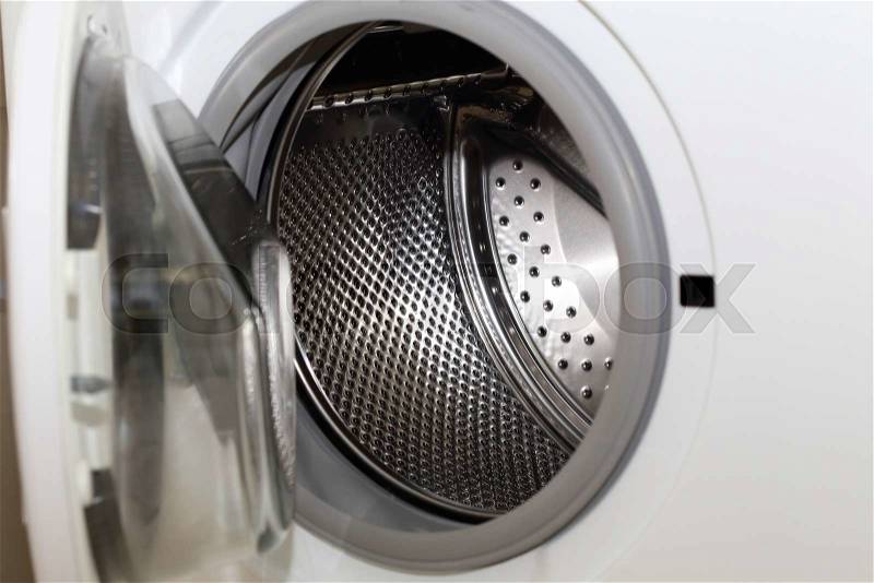 White washing machine for housework clothes cleaning, stock photo