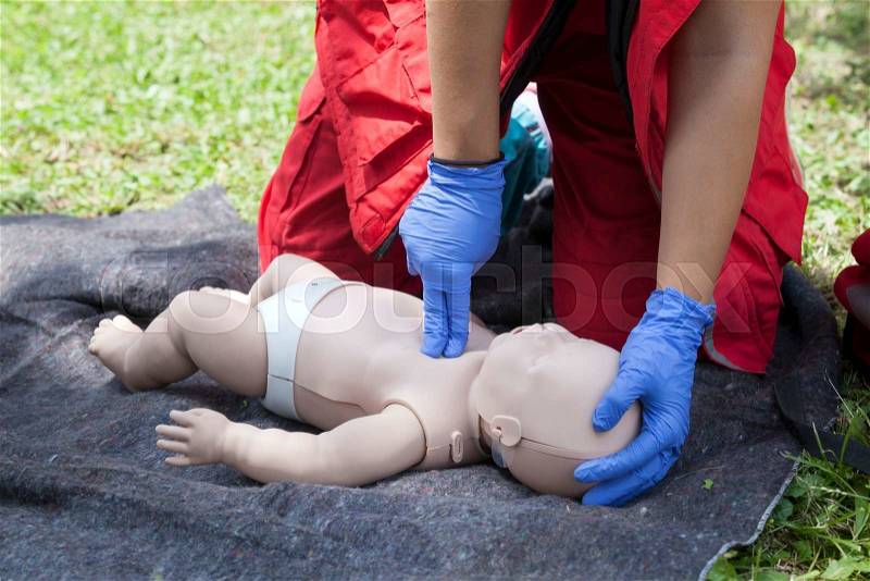 Baby CPR dummy first aid training. Cardiopulmonary resuscitation - CPR, stock photo