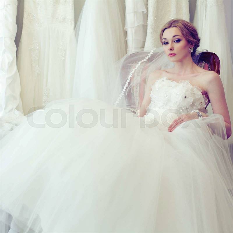 Beautiful glamour bride on vintage background, stock photo