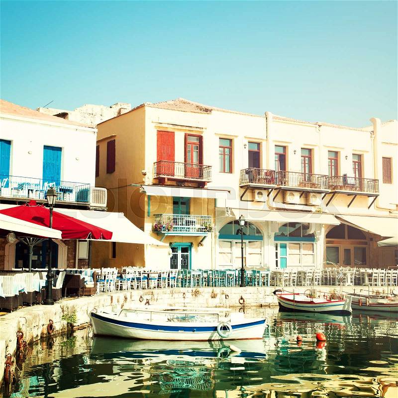 Crete Rethymnon, coffee shop, boats and sea, impressions of Greece, stock photo