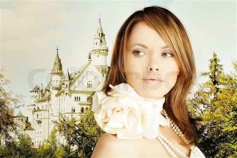 Rromantic escape, beautiful young woman and fairytale castle, stock photo