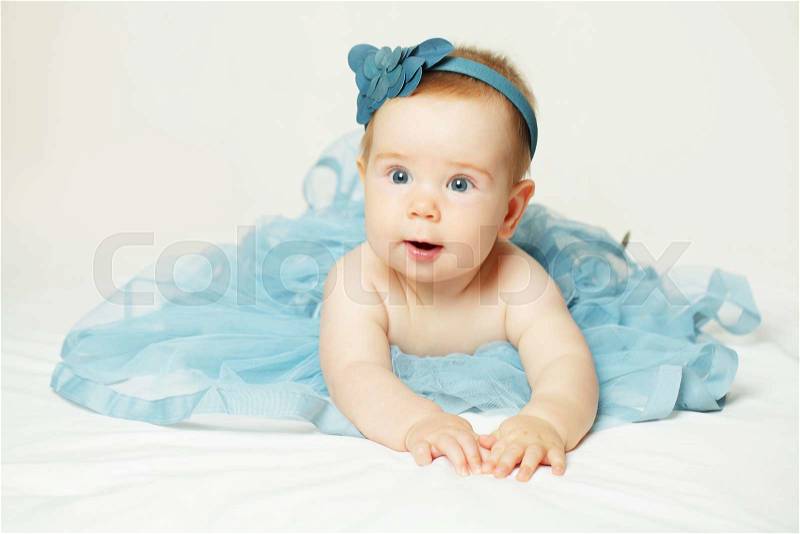Sweet little baby, cute small girl in lace skirt, stock photo