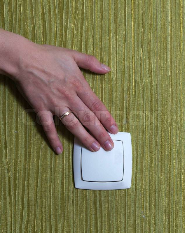 Light power switch being turned on off, stock photo