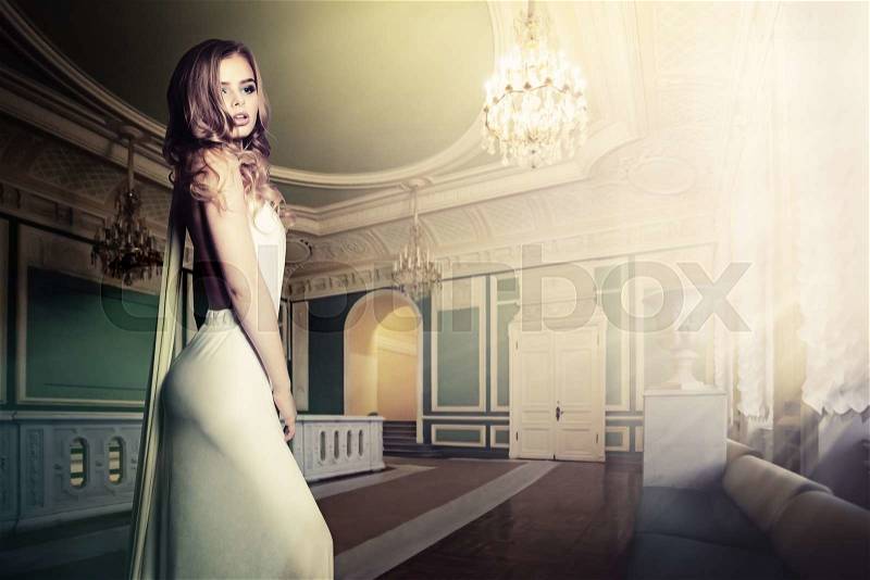 Glamorous Woman in Palace Interior, stock photo