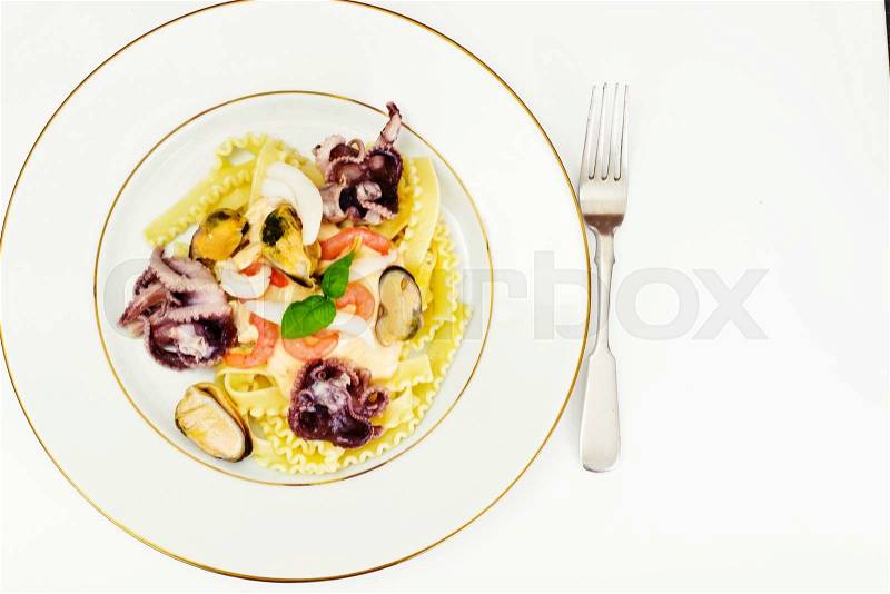 Pasta with White Sauce and Seafood Studio Photo, stock photo