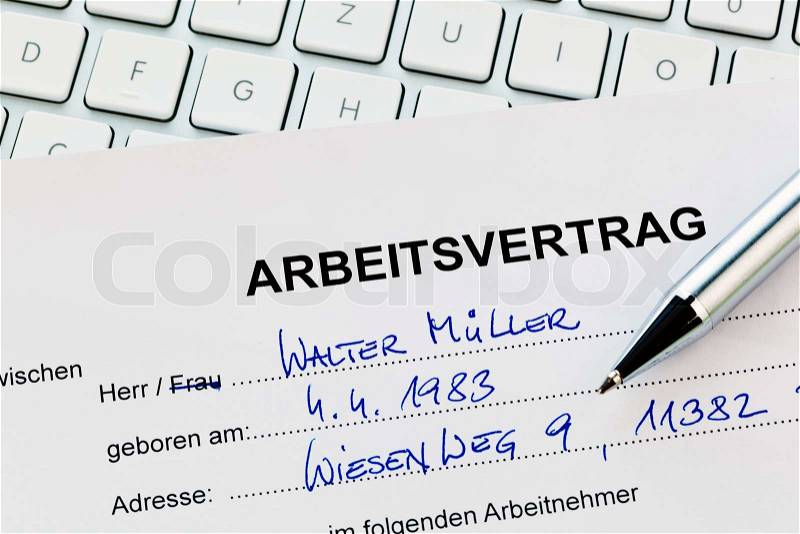 The employment of an employee with the employer. (In German), stock photo