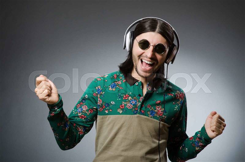 Young man with headphones in DJ concept, stock photo
