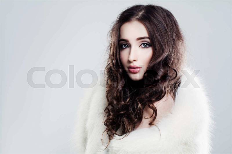 Femininity Beauty. Beautiful Woman with Long Brown Hair, stock photo