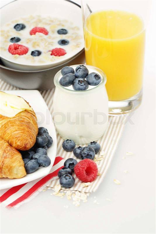 Breakfast with Yogurt, Orange Juice, Berries and Croissant, stock photo