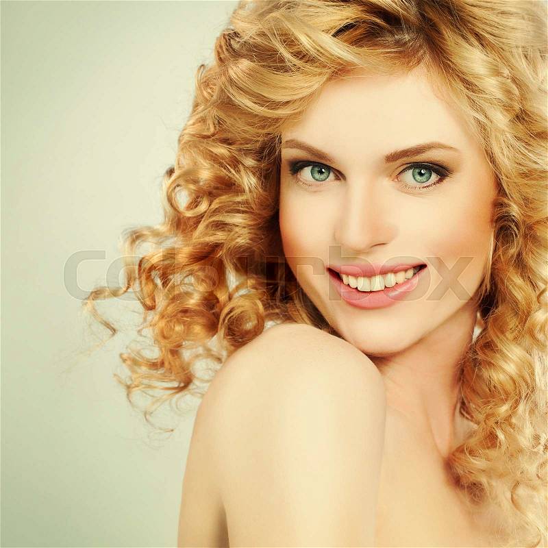 Blond Woman with Curly Coloring hair, stock photo