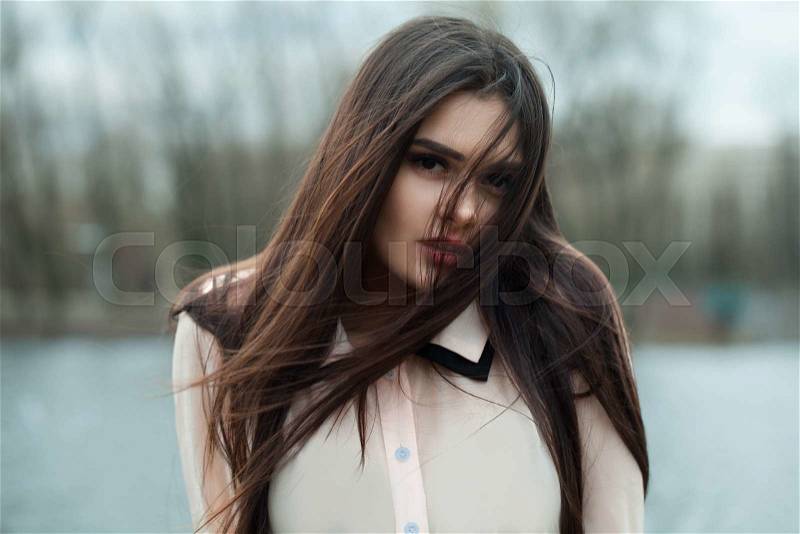 Beautiful Girl Model in a Blouse Outdoor, stock photo
