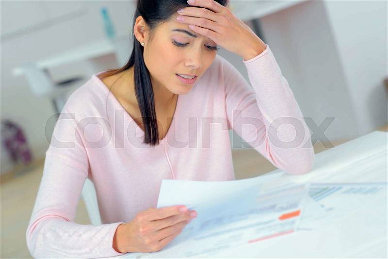 Woman experiencing money problems, stock photo