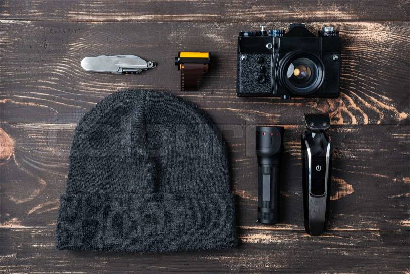 Trip concept - items of men\'s clothing and accessories on the desk, stock photo