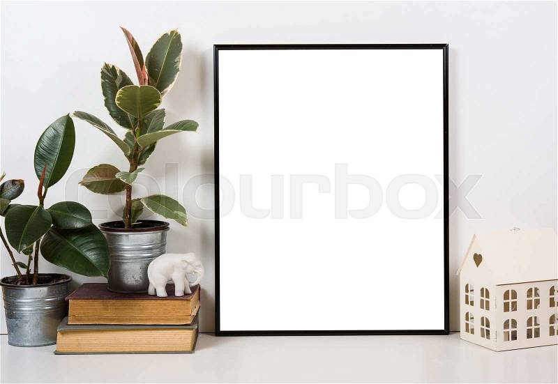 Styled tabletop, empty frame, painting art poster interior mock-up isolated closeup, stock photo