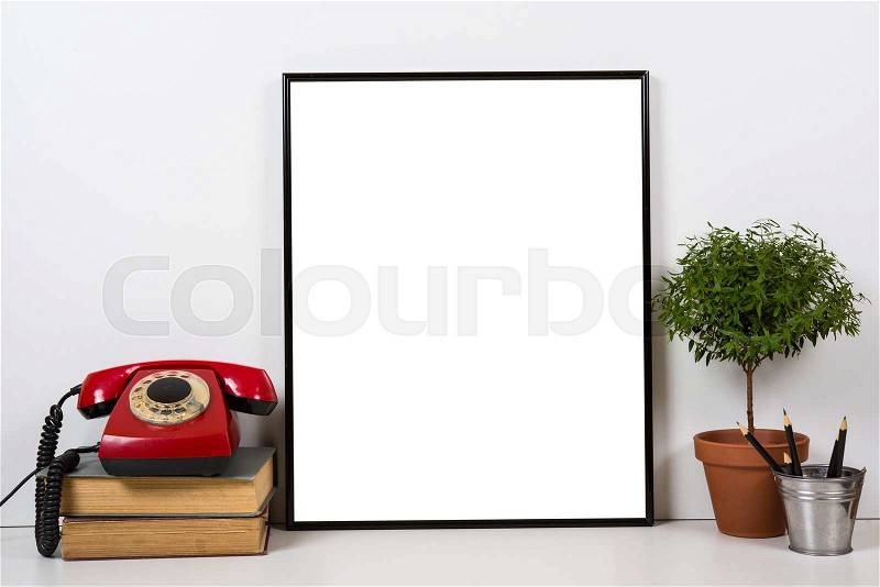 Styled tabletop, empty frame, painting art poster interior mock-up isolated closeup, stock photo