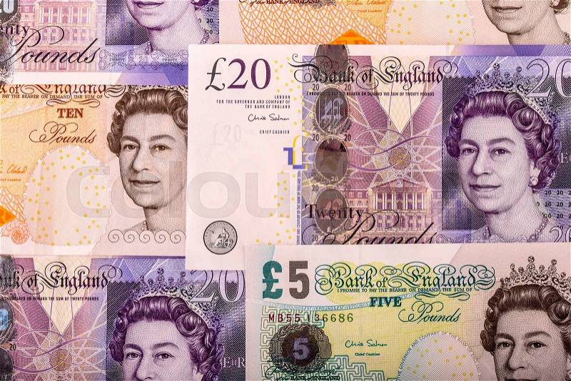 Pound currency, money, banknote. English currency. UK banknotes of different values stacked on each other, stock photo