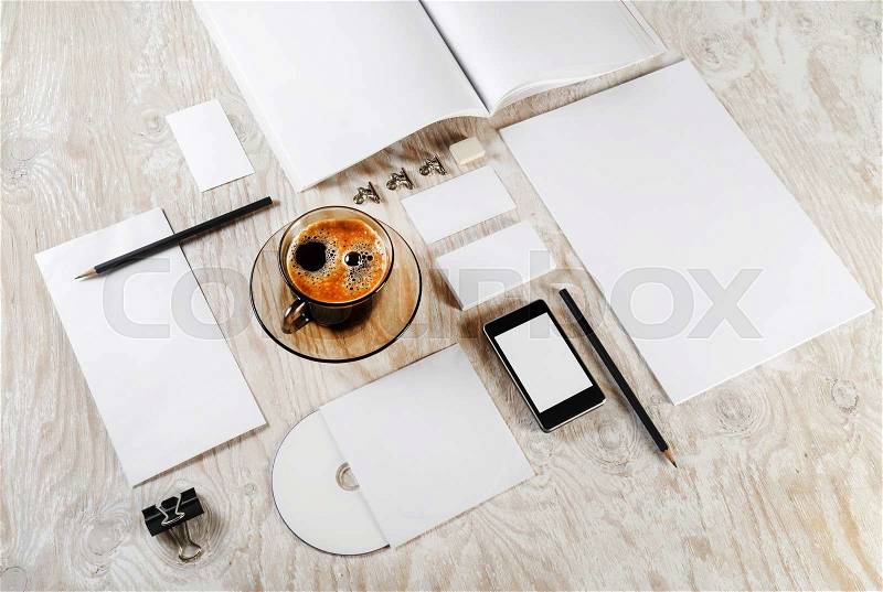 Photo of blank stationery set. Blank ID template on light wooden background. Mock-up for branding identity. Blank template for your design, stock photo