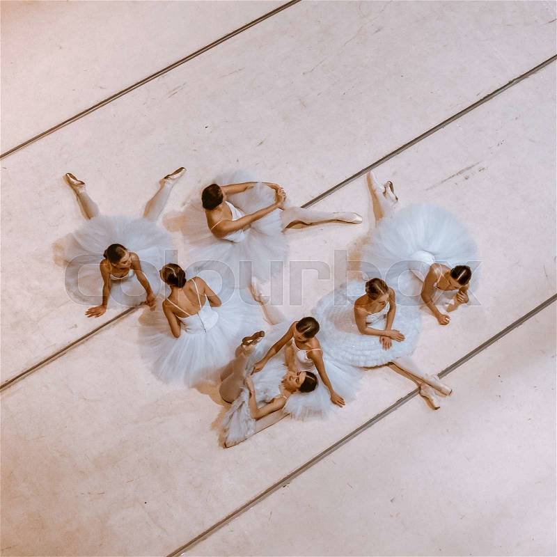 The top view of ballerinas on floor in the rehearsal hall of the theater, stock photo