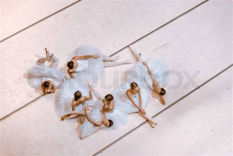 The top view of ballerinas on floor in the rehearsal hall of the theater, stock photo