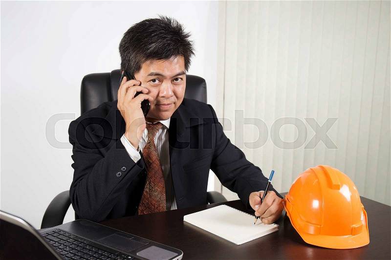 Asian businessman working with labtop on the desk , stock photo