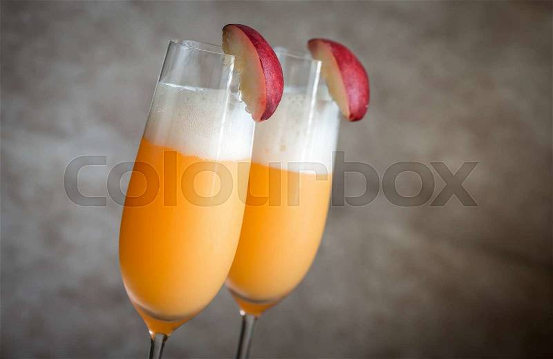Two bellini cocktails, stock photo