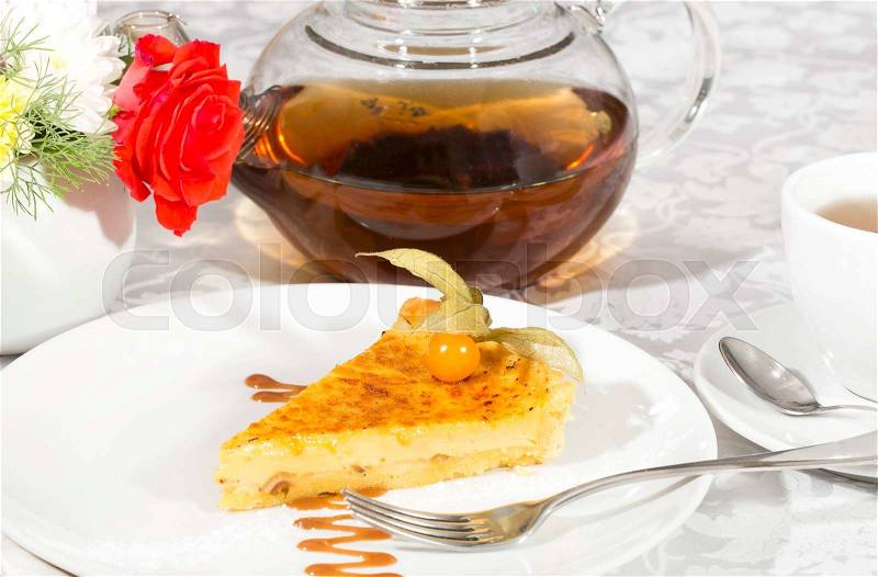 Piece of cake with passion fruit on a white background, stock photo