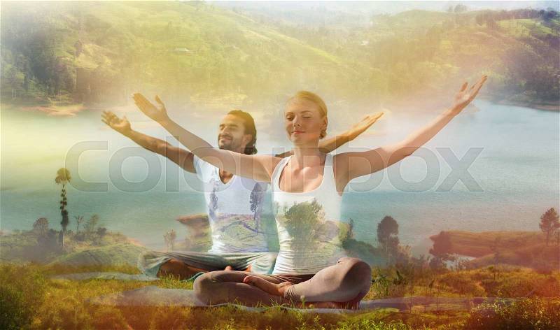 Yoga retreat, fitness, sport and lifestyle concept - smiling couple making exercises sitting on mats outdoors, double exposure effect, stock photo