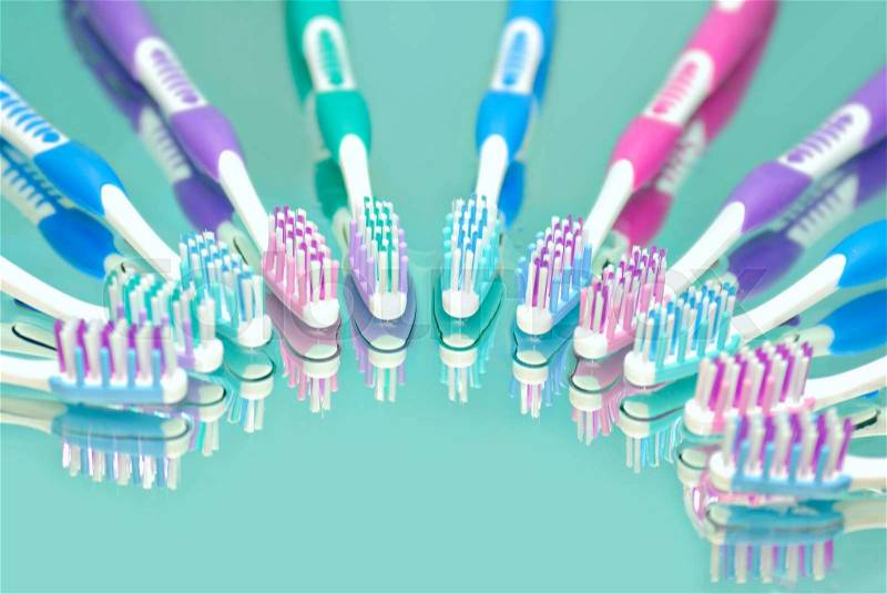 Toothbrushes in water drops, stock photo