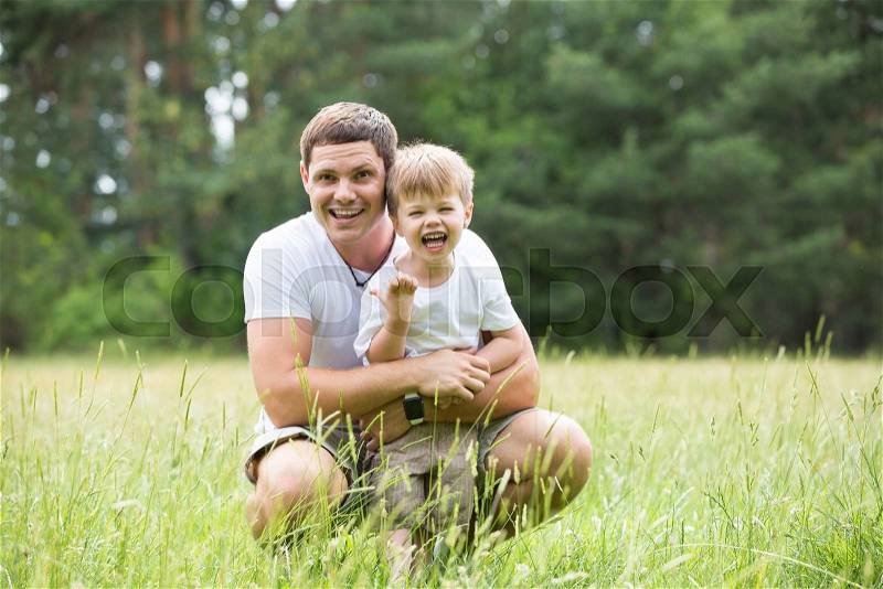 Father and son relationship, playing in the Park, stock photo